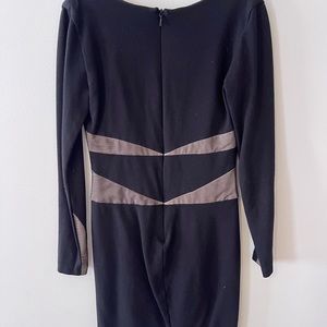Black and tan fitted dress above the knee